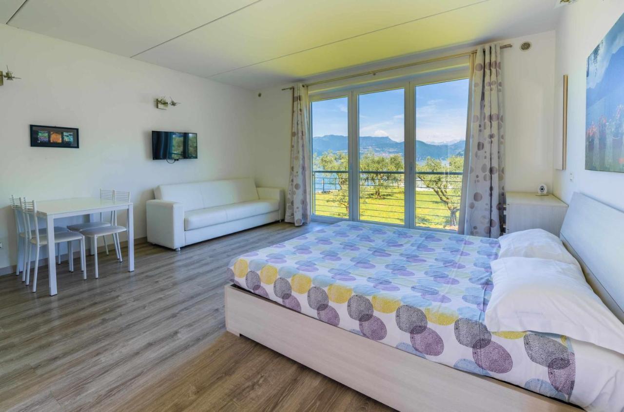 Direttamente Al Lago Apartments Marone Bagian luar foto